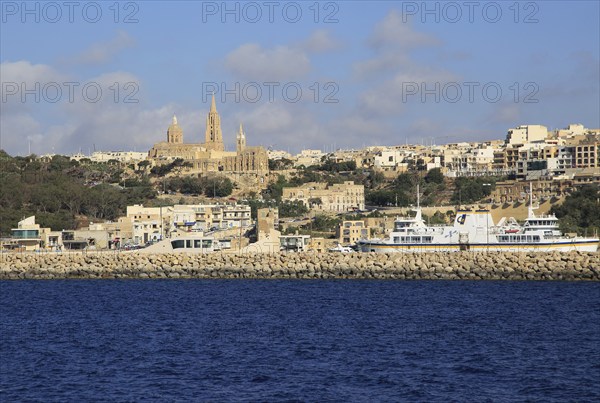 View from Gozo Channel Line ferry ship approaching port of Mgarr, Gozo, Malta, Europe