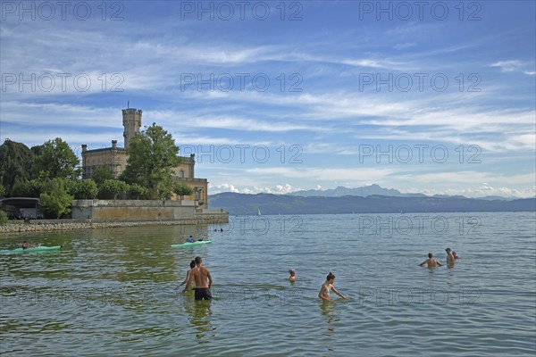 Bathers in the water on the shore, Montfort Castle, lake, bathing, bathing guest, kayaker, lake,