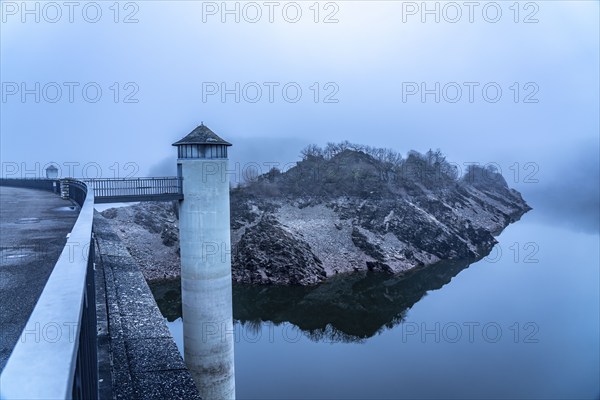 The dam wall of the Urft dam, in the Eifel, reservoir, in winter, fog, near Schleiden, North
