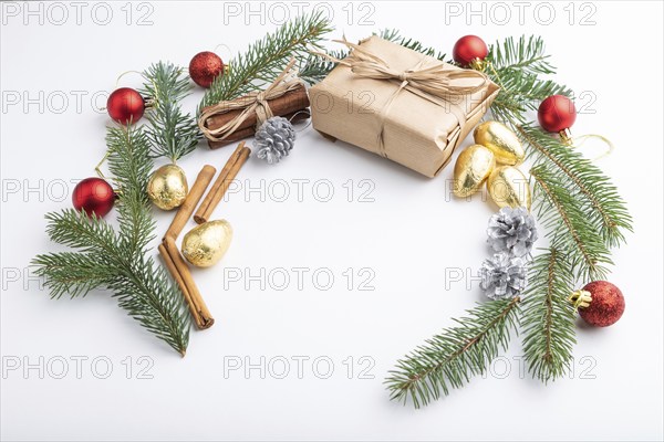 Christmas or New Year wreath composition. Decorations, balls, fir and spruce branches, on white