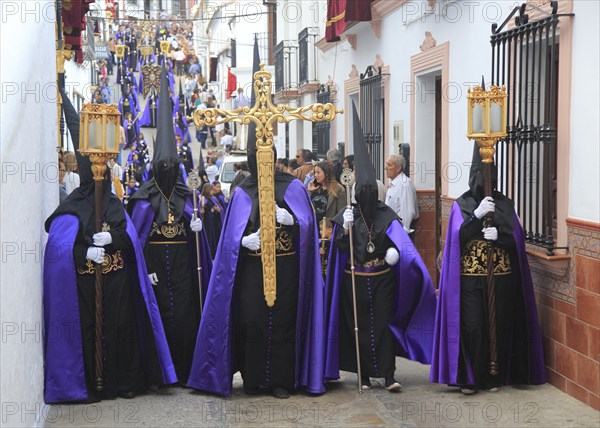 Easter Christian religious procession through streets of Setenil de las Bodegas, Cadiz province,
