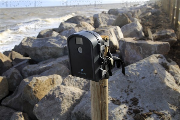 Wingscapes time lapse digital camera mounted on a post at Bawdsey, Suffolk, England, UK