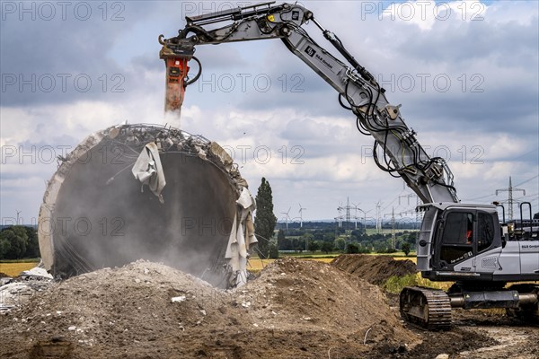 Demolished tower of a 20 year old wind turbine, in the Werl wind farm, 5 old Enercon E-66 turbines