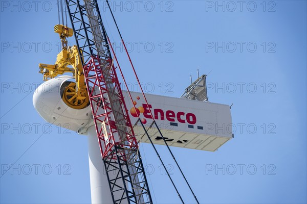 Wind farm under construction, on the Maasvlakte, the harbour of Rotterdam, over 20 wind turbines