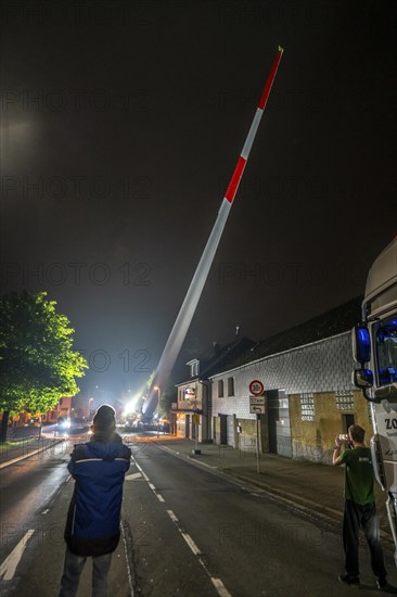 Transport of a 68 metre long, 22 tonne blade of a wind turbine, here in Breckerfeld, with a