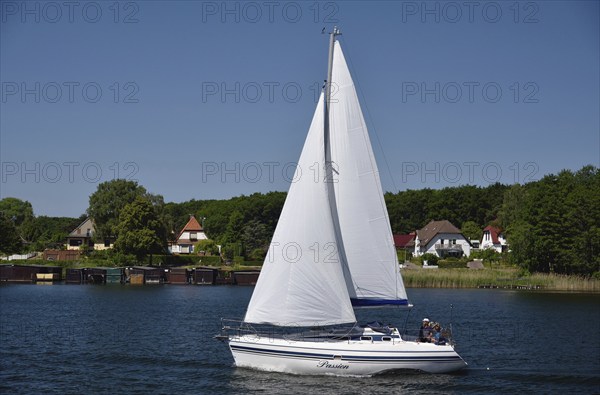 Europe, Germany, Mecklenburg-Western Pomerania, island town of Malchow, Lake Malchow, sailing boat,