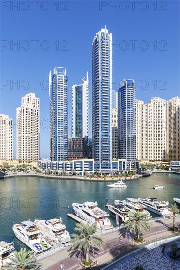Dubai Marina skyline skyscrapers with yachts skyscrapers living on the waterfront in Dubai, United