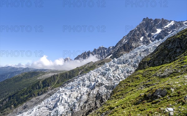 Mountain landscape with glacier Glacier des Bossons and summit of the Aiguille du Midi, Chamonix,