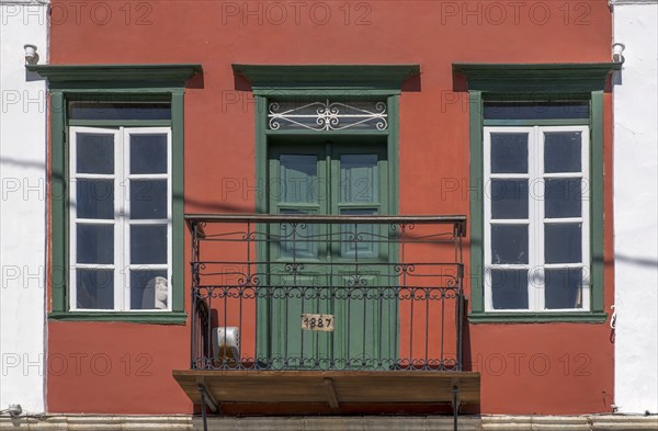 House facade with balcony, Symi Island, Dodecanese, Greek Islands, Greece, Europe