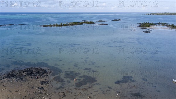 Bird's eye view of aerial view of lagoon and small islands at Cap Malheureux, Mauritius, Africa