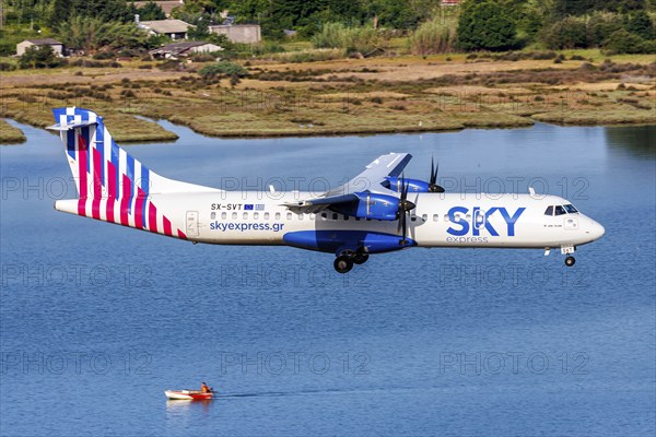 An ATR 72-600 Sky Express aircraft with the registration SX-SVT at Corfu Airport, Greece, Europe