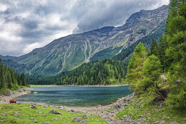 Obernberger See, mountain lake, landscape of the Stubai Alps, weather mood, cloud mood, Obernberg