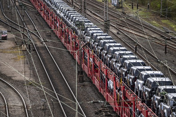 Freight train, car train with Landrover new cars on the goods train line at the Hagen-Vorhalle