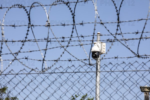 Video surveillance on a barbed wire fence