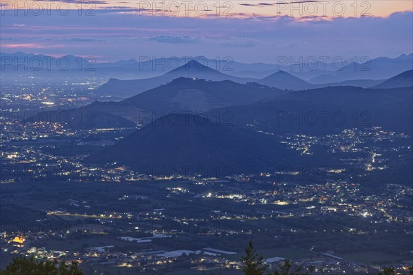 View of the densely populated Neapolitan region and the mountains near Caserta at dusk. San Felice