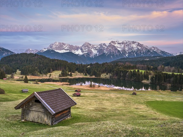 Huts at Geroldsee or Wagenbrüchsee, sunset, Krün near Mittenwald, Karwendel, Werdenfelser Land,