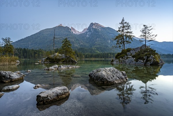Hochkalter reflected in Hintersee, at sunset, Berchtesgaden National Park, Ramsau, Upper Bavaria,