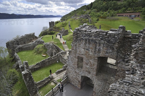 The ruins of Urquhart Castle beside Loch Ness near Drumnadrochit, Scotland, UK