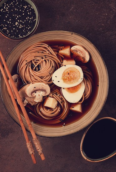 Asian soba soup, with mushrooms and egg, cheese, sesame seeds, homemade, no people