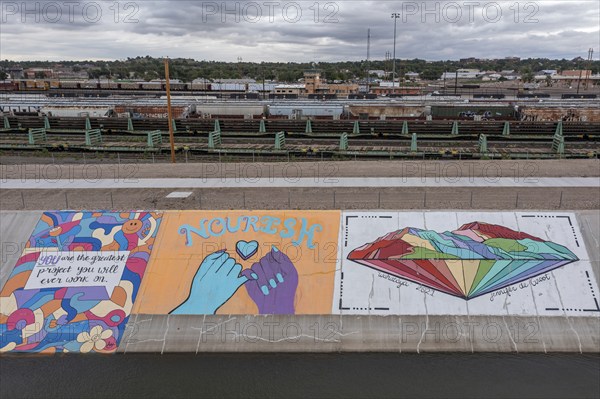 Pueblo, Colorado, Murals line a concrete levee for three miles along the Arkansas River. The levee