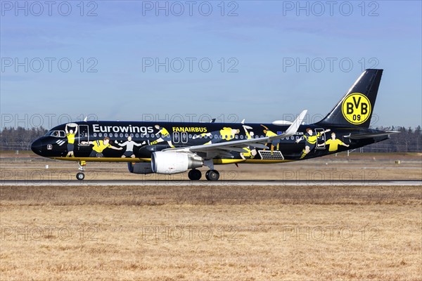 A Eurowings Airbus A320 aircraft with the registration D-AEWM and the Borussia Dortmund special