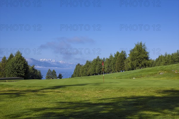 Crans Sur Sierre Golf Course with Mountain View in Crans Montana in Valais, Switzerland, Europe