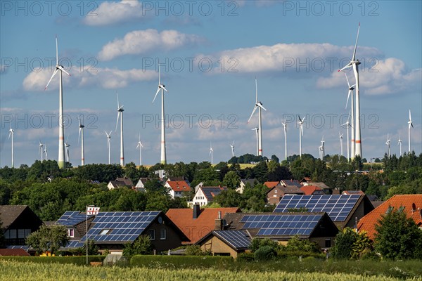 Wind farm near the East Westphalian town of Energiestadt Lichtenau, many residential buildings with