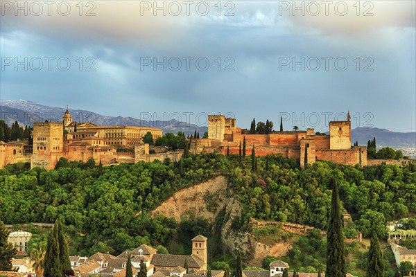 Alhambra on the Sabikah hill at sunset, Moorish city castle, Nasrid palaces, Sierra Nevada with
