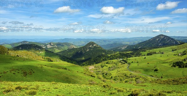 Scenic View of Dome-Shaped Volcanic Peaks (Sucs) in the Monts d'Ardeche Regional Natural Park.