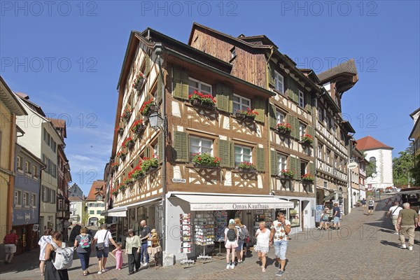 Half-timbered houses with shop and pedestrians, tourists, market place, Meersburg, Obersee, Lake
