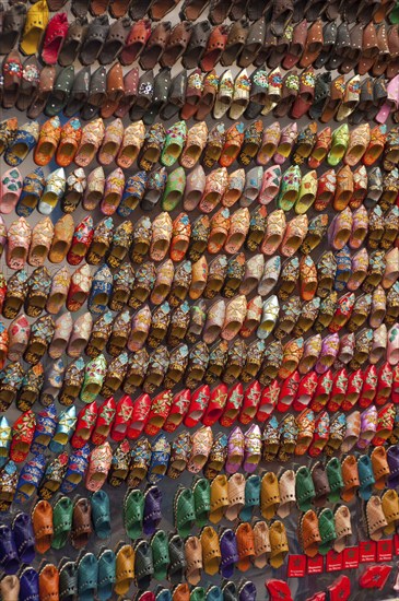 Small babouche magnets on a market, shoes, painted, trade, market, trader, bazaar, offer,