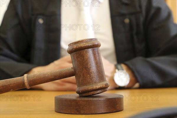 Close-up of a judge's gavel as a symbolic image for a court judgement
