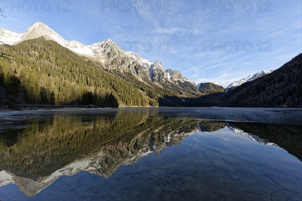 Winter on an icy lake, Lake Antholz in the Antholz Valley, Val Pusteria, South Tyrol, Italy, Europe
