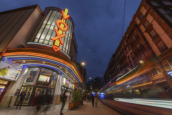 The Vox cinema in Strasbourg illuminated at night. Bas-Rhin, Alsace, Grand Est, France, Europe