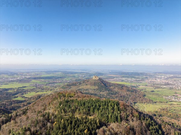 Aerial view from the Albtrauf over a mixed forest on the 956 metre high Raichberg to the Zeugenberg