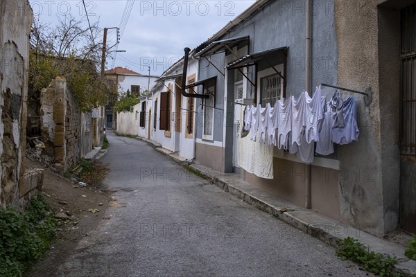 House laundry hanging on a rope and drying outdoor in the clean air saving the environment. Nicosia
