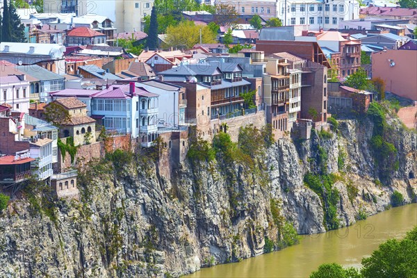 Tbilisi, Georgia, April 29, 2017: Aerial panoramic skyline with old traditional houses over Mtkvari