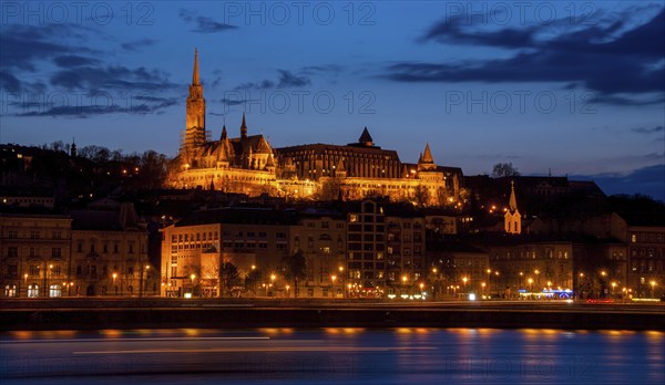 Royal Palace or the Buda Castle after sunset with lights illuminated at in danube river in Budapest