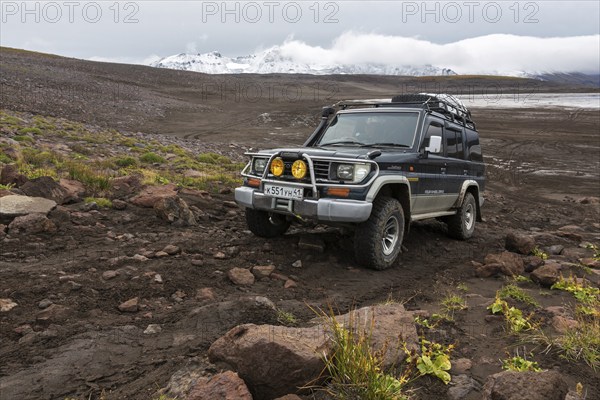 KAMCHATKA PENINSULA, RUSSIA, SEP 17, 2016: Extreme off-road expedition auto Toyota Land Cruiser