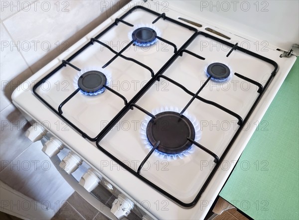Energy efficiency concept with gas cooker – the cost of natural gas is more expensive. Selective