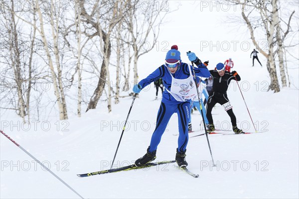 PETROPAVLOVSK CITY, KAMCHATKA PENINSULA, RUSSIAN FAR EAST, FEBRUARY 10, 2018: Skiers running on ski