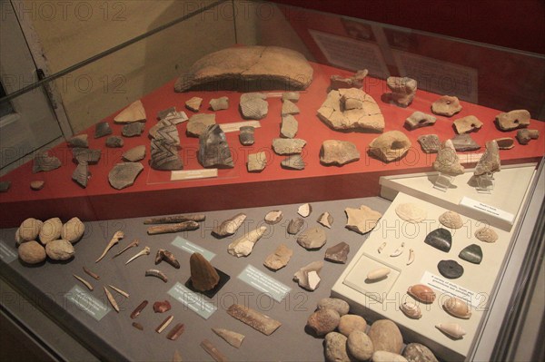 Pottery and tool display of neolithic finds, National Museum of Archaeology, Valletta, Malta,
