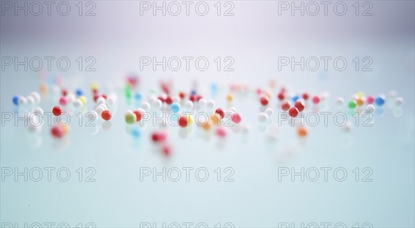 Colourful nonpareils, sugar pearls, sprinkle decorations in bright colours, mini sugar balls for