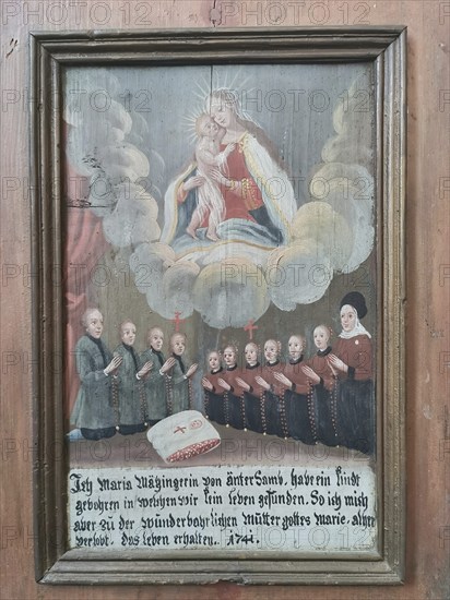 Votive pictures, votive tablets on the walls of the chapel of grace inside the church, pilgrimage