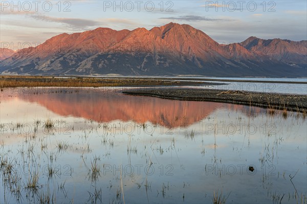 Morning light, mountains reflected in lake, autumn, wilderness, Kluane Lake, Kluane Mountains,