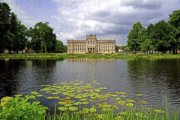 Europe, Germany, Mecklenburg-Western Pomerania, Ludwigslust, Ludwigslust Palace, front with water