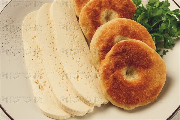 Mchadi, corn tortillas, traditional Georgian dish, corn bread, with Imeretian cheese, homemade, no