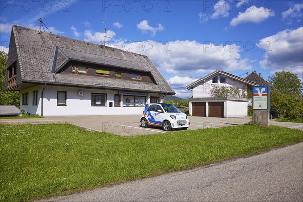 Volksbank Rhein-Wehra eG, branch with car park and car in the Innerlehen district, Bernau im Black