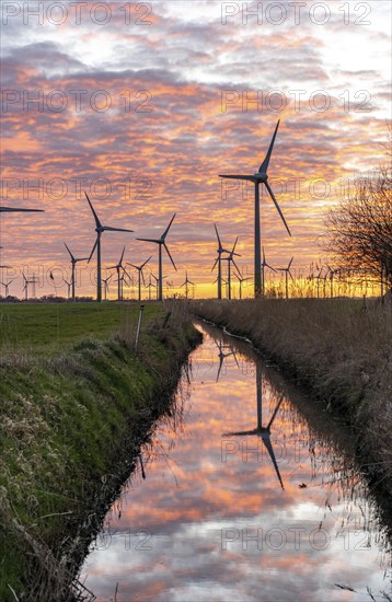 Wind farm near the East Frisian town of Norden, east of the town, sunset, Lower Saxony, Germany,
