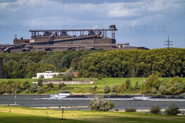 Rhine at Duisburg-Beeckerwerth, freighter loaded with coal, Oxygen steelworks 2 Industrial backdrop